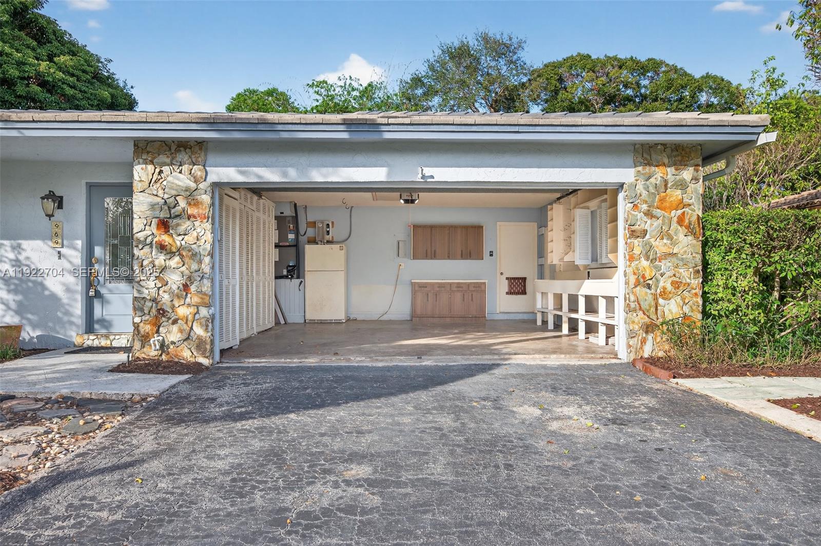 969 Northwest 8th Street Boca Raton, FL 33486 - Photo 34 of 38 a front view of a house