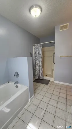 a bathroom with a sink vanity and mirror