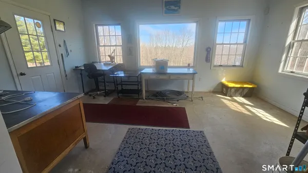 a living room with a couch and a table