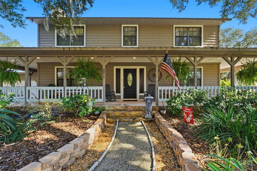 2911 Walker Road Lakeland, FL 33810 - Photo 2 of 70 front view of a house