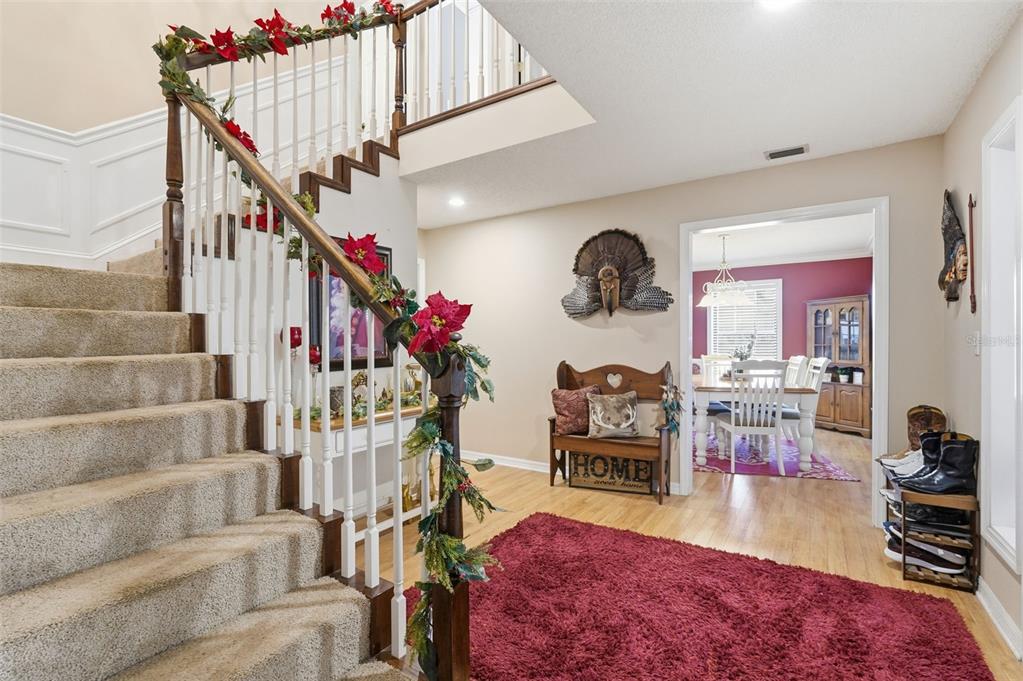 2911 Walker Road Lakeland, FL 33810 - Photo 23 of 70 a view of entryway bedroom and hall with wooden floor