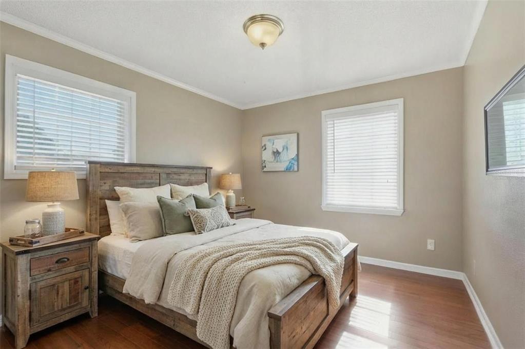 2911 Walker Road Lakeland, FL 33810 - Photo 28 of 70 a bedroom with a bed and a window