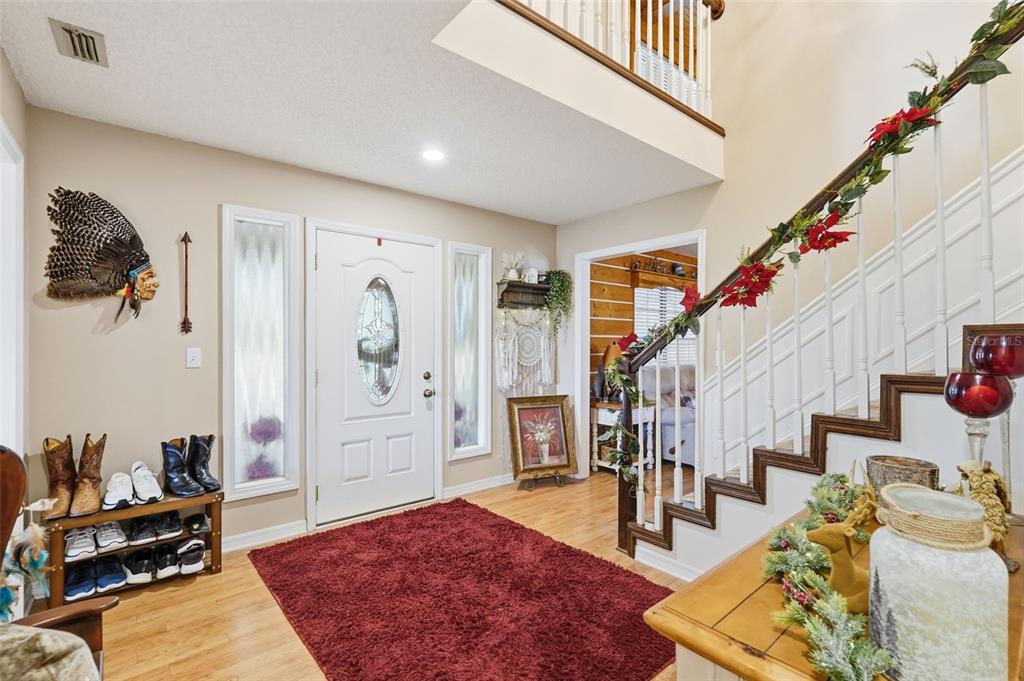 2911 Walker Road Lakeland, FL 33810 - Photo 5 of 70 a living room with furniture and wooden floor