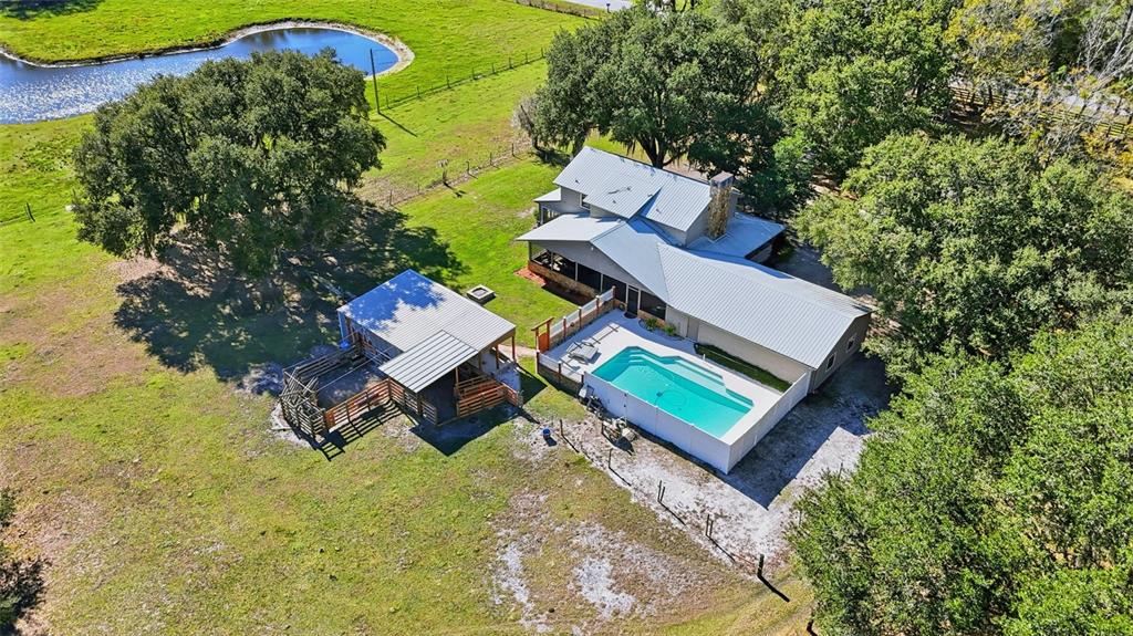 2911 Walker Road Lakeland, FL 33810 - Photo 67 of 70 an aerial view of a house with garden space and sitting area
