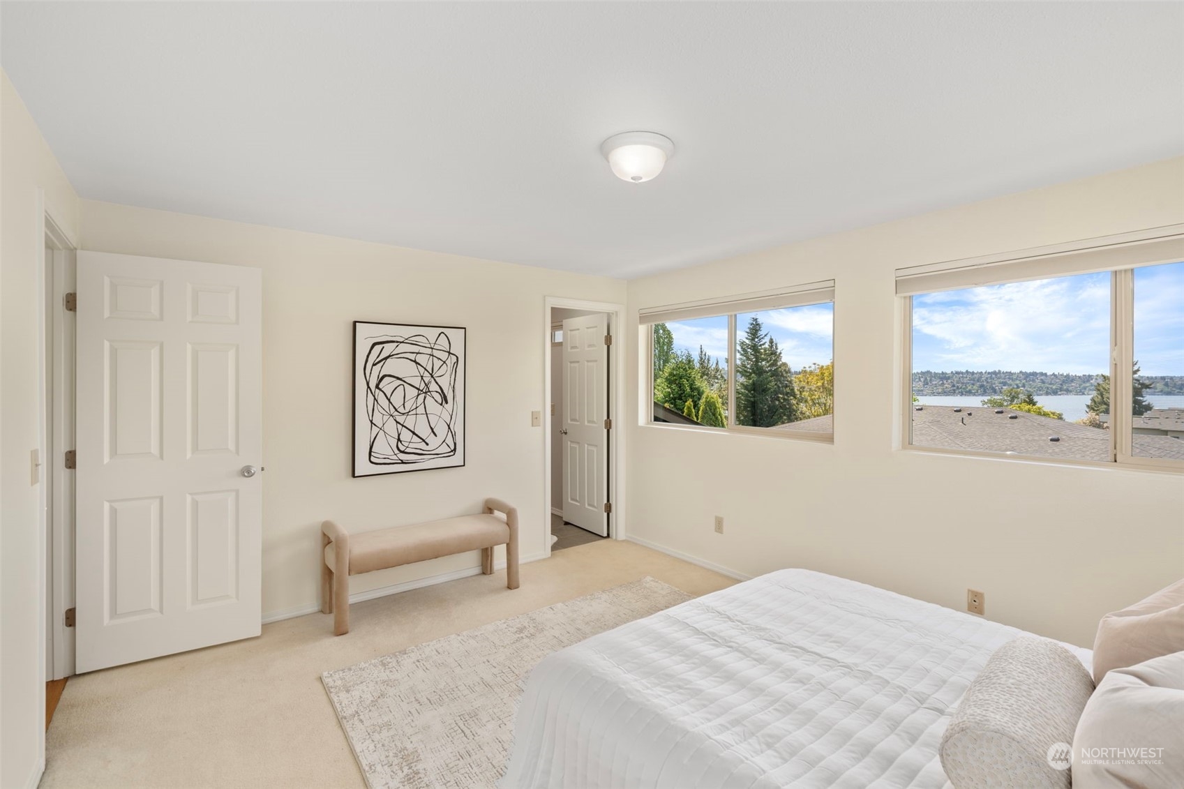 1201 North 28th Place Renton, WA 98056 - Photo 9 of 25 a bedroom with a bed and a window