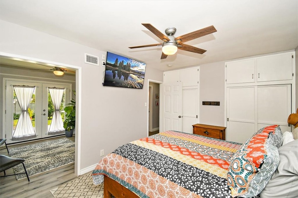 3315 Spring Garden Street Riverside, CA 92501 - Photo 17 of 38 a bedroom with a bed and a window