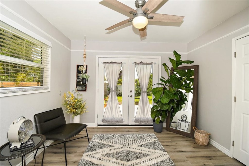 3315 Spring Garden Street Riverside, CA 92501 - Photo 20 of 38 a living room with furniture and a potted plant