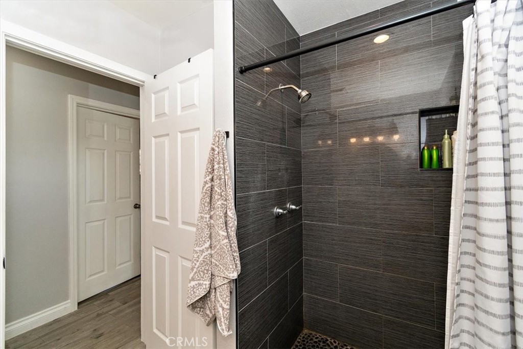 3315 Spring Garden Street Riverside, CA 92501 - Photo 23 of 38 a bathroom with a shower