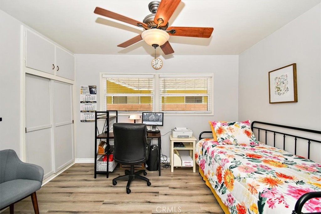 3315 Spring Garden Street Riverside, CA 92501 - Photo 24 of 38 a bedroom with furniture and a window