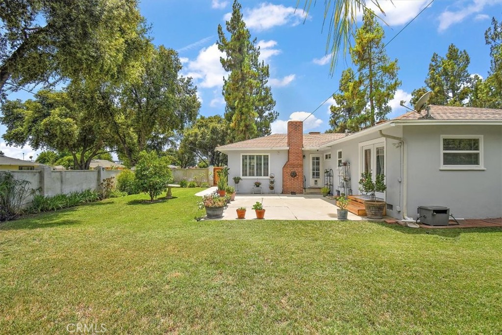 3315 Spring Garden Street Riverside, CA 92501 - Photo 27 of 38 a view of a house with backyard and sitting area