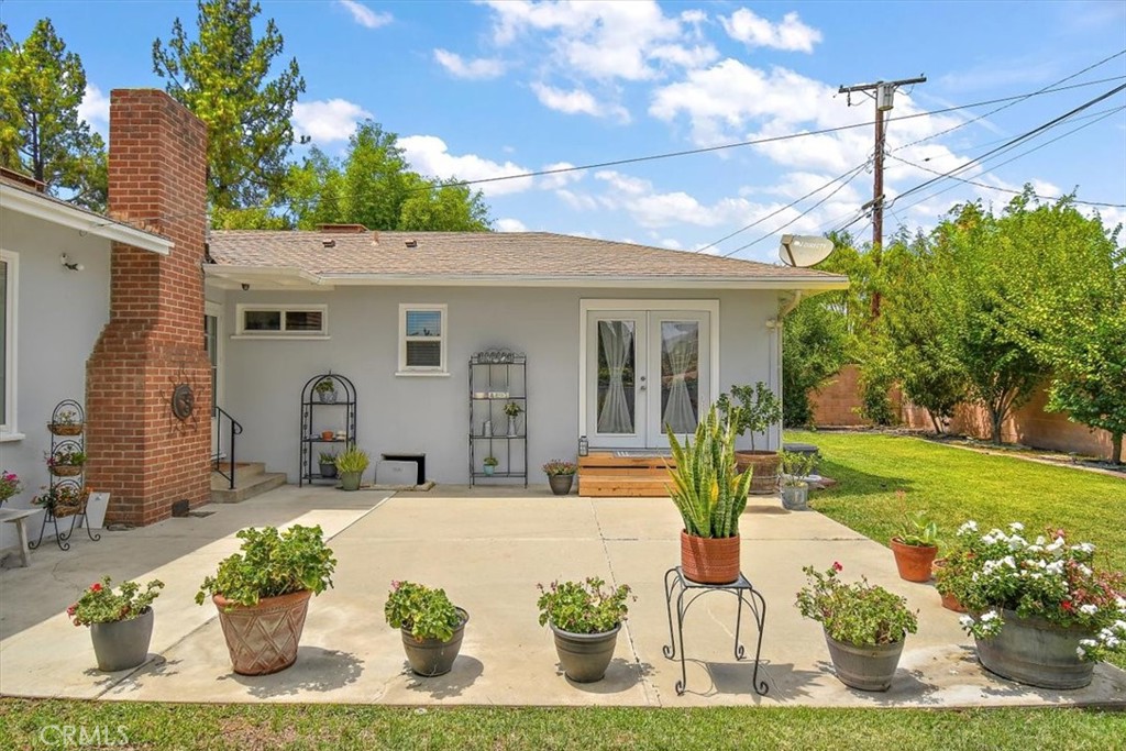 3315 Spring Garden Street Riverside, CA 92501 - Photo 28 of 38 a front view of a house with garden
