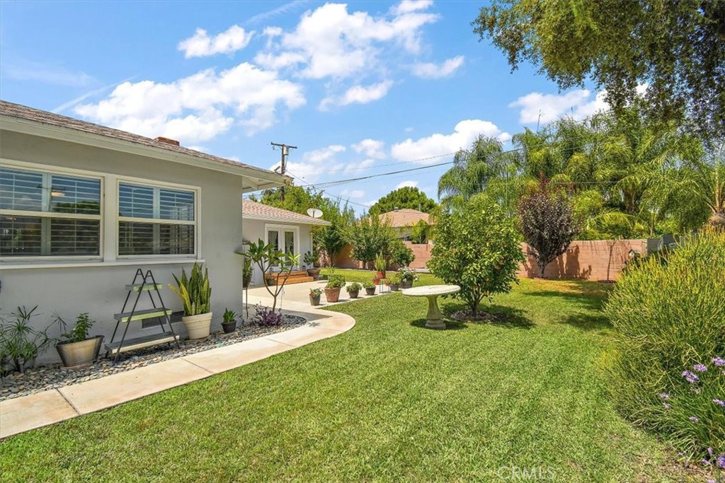 3315 Spring Garden Street Riverside, CA 92501 - Photo 30 of 38 a view of a house with backyard porch and sitting area