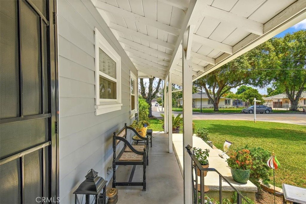 3315 Spring Garden Street Riverside, CA 92501 - Photo 3 of 38 a view of patio with table and chairs and garden