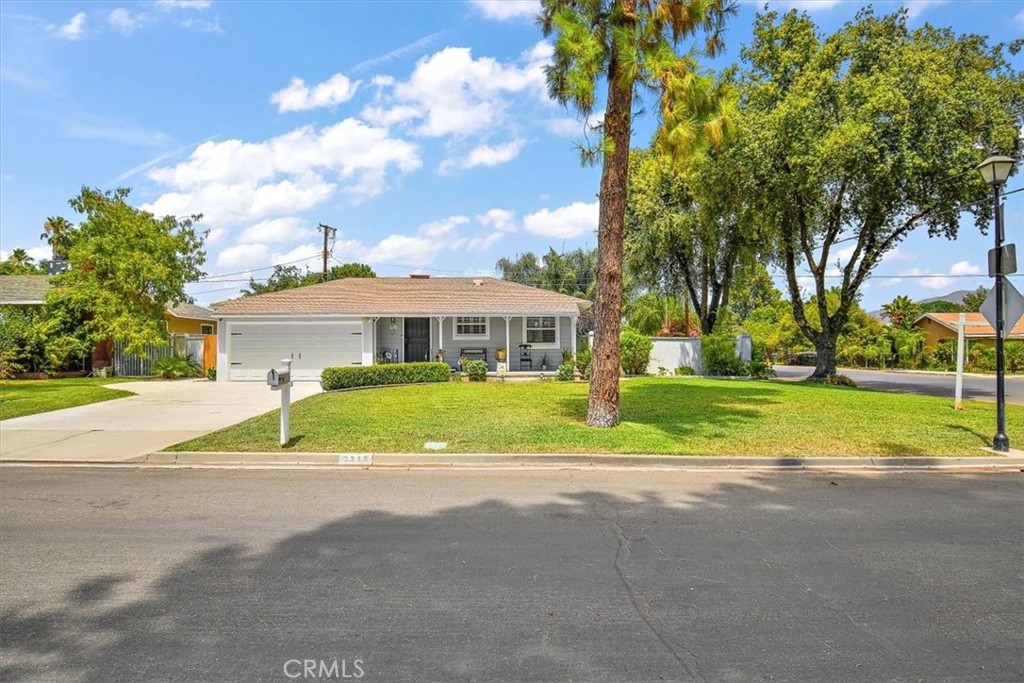 3315 Spring Garden Street Riverside, CA 92501 - Photo 32 of 38 a view of house with outdoor space and street view