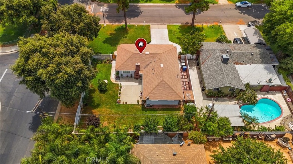 3315 Spring Garden Street Riverside, CA 92501 - Photo 35 of 38 an aerial view of a house with a yard