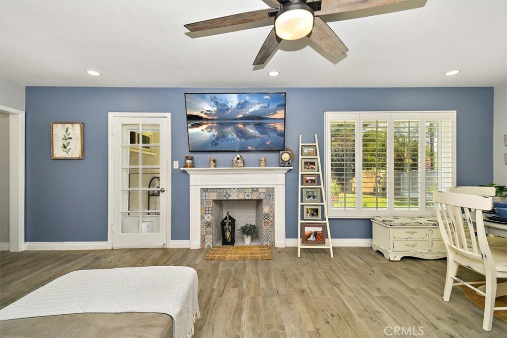 3315 Spring Garden Street Riverside, CA 92501 - Photo 7 of 38 a living room with furniture and a fireplace