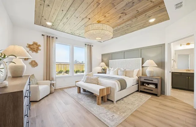 a bed room with a bed and a couch