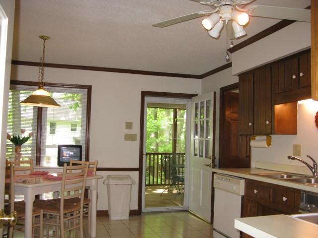 4201 Webster Court Raleigh, NC 27609 - Photo 4 of 25 Tons of cabinets and a built in desk. Room to add a large kitchen table or center island with seating. Large 16 X15.5 Kitchen off Dining Room and Screened Porch. Great Traffic Flow for entertaining! Eat-in Kitchen 16x15