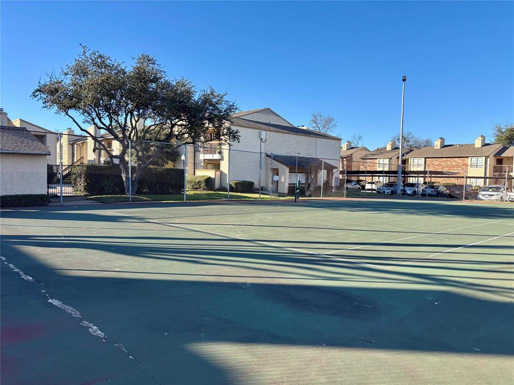 12480 Abrams Road, Unit 2805 Dallas, TX 75243 - Photo 7 of 18 View of asphalt road featuring a residential view and curbs