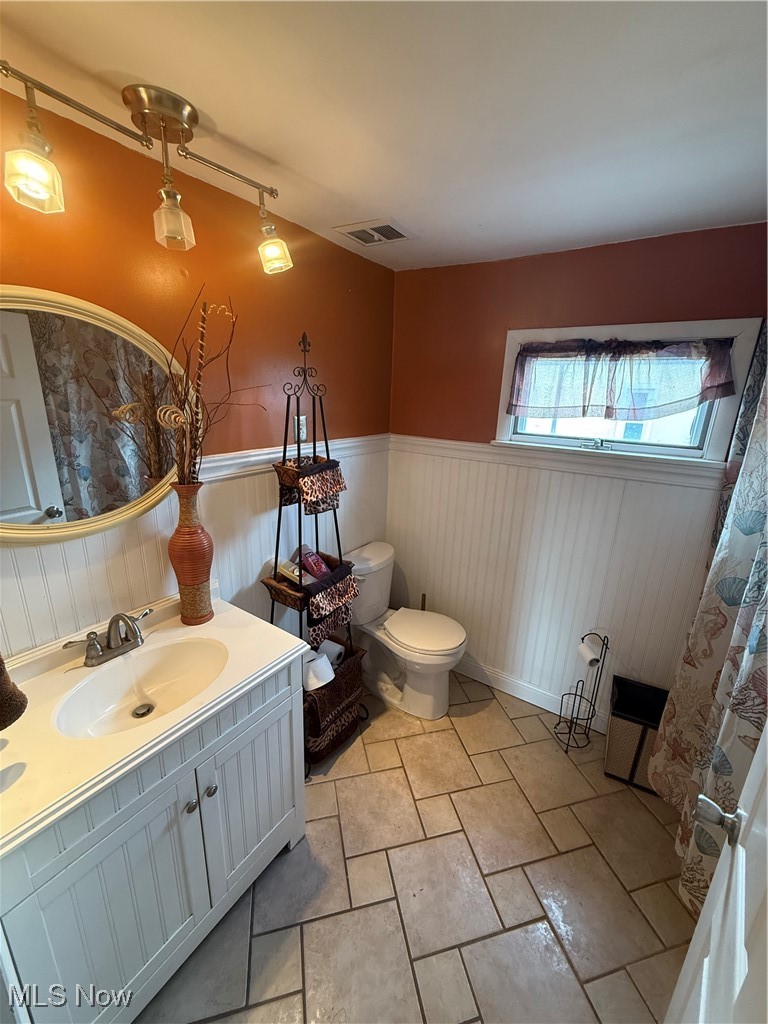 2614 Eldersville Road Follansbee, WV 26037 - Photo 16 of 18 Bathroom with vanity and wainscoting