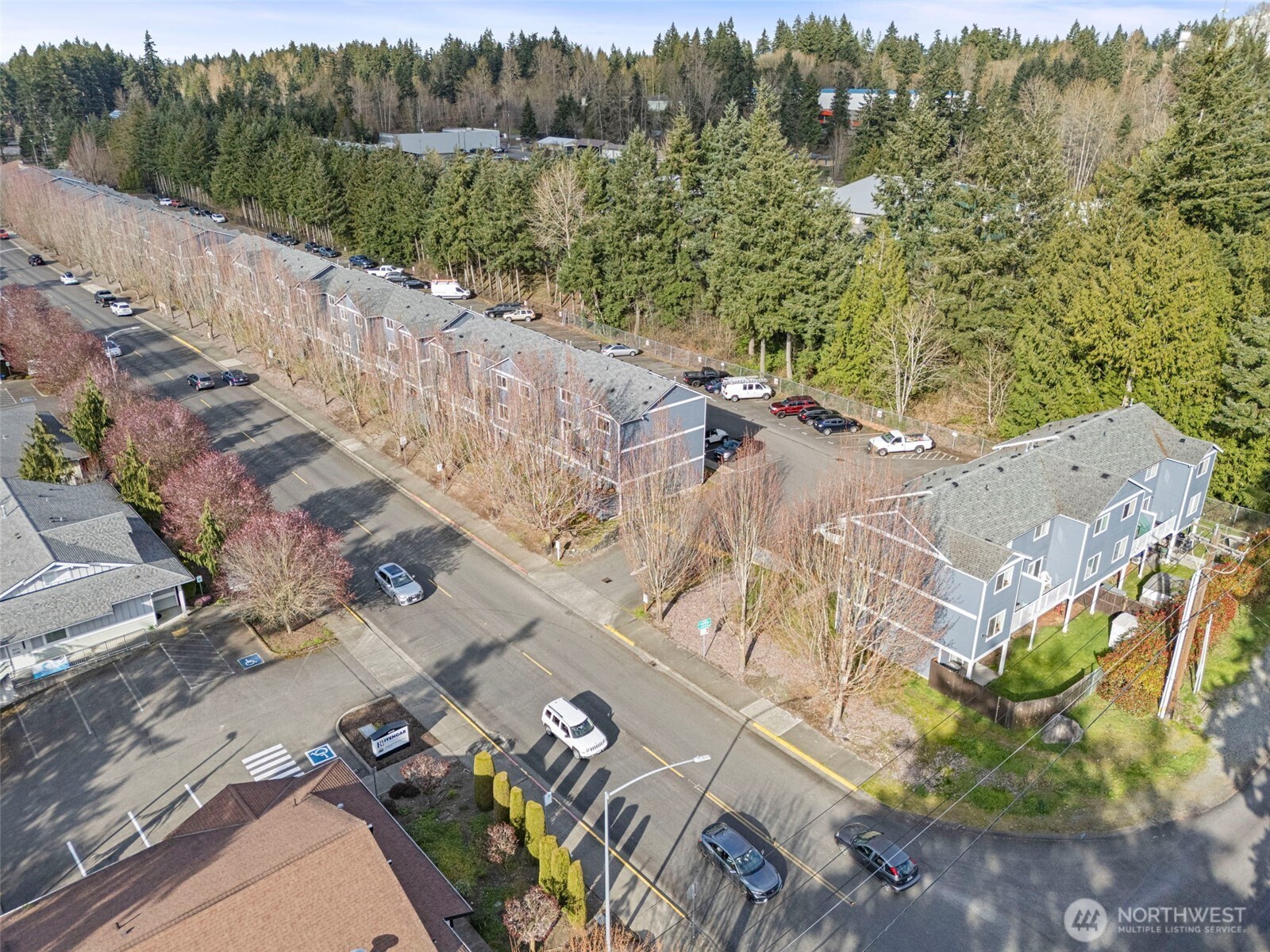 3939 10th Street Southeast, Unit G4 Puyallup, WA 98374 - Photo 24 of 25 a view of a lake with a mountain