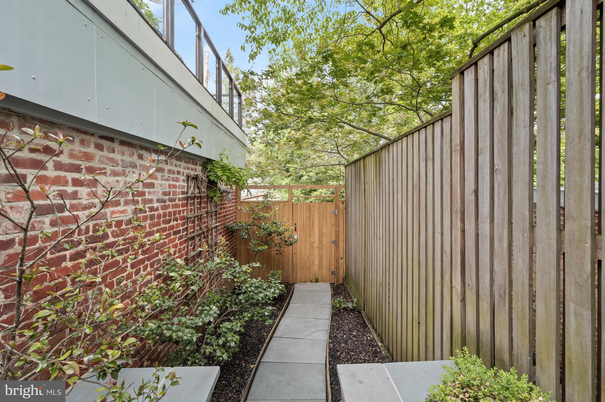 1931 38th Street Northwest Washington, DC 20007 - Photo 38 of 45 Stone walkway to rear alley