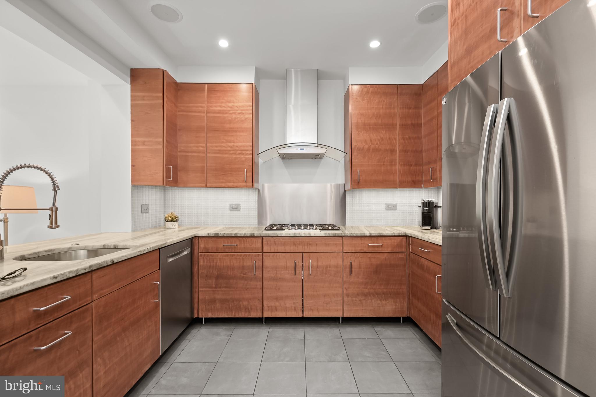 1931 38th Street Northwest Washington, DC 20007 - Photo 6 of 45 Sophisticated cherry cabinets w/ pullout drawers