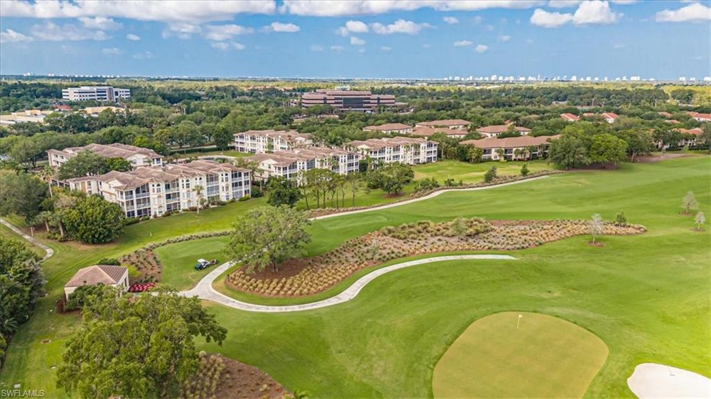 6025 Chardonnay Lane, Unit 103 Naples, FL 34119 - Photo 40 of 45 a view of a city