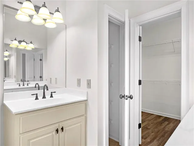 a view of an house with backyard and porch