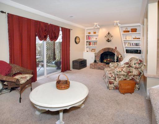 224 Falls Village Road Plum, PA 15239 - Photo 9 of 18 Den/Family/Great Room. Exquisite fireplace with built-ins and lighting. French doors lead to the patio, back yard and beautiful garden.
