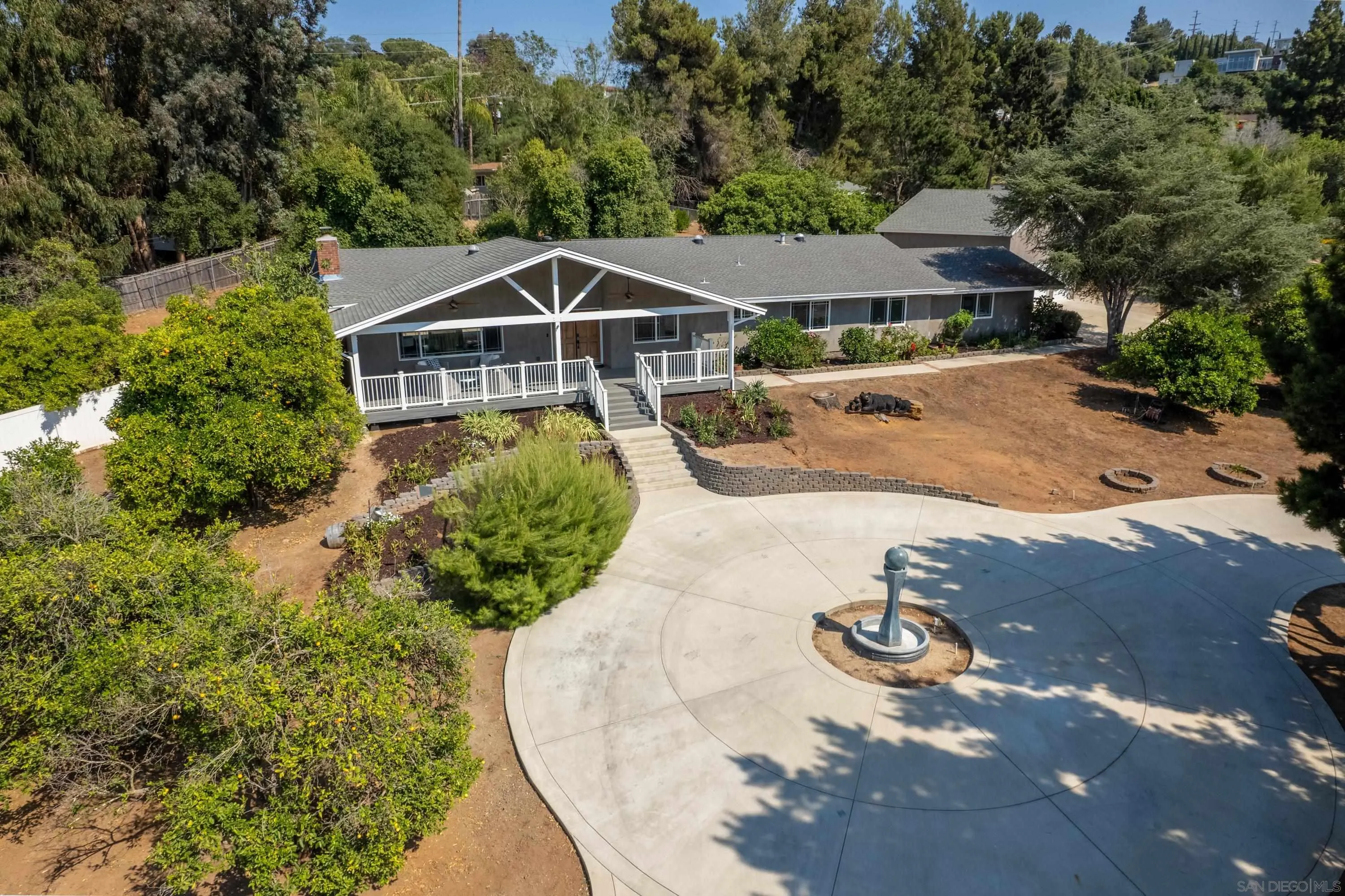 16355 Orchard Bend Road Poway, CA 92064 - Photo 3 of 49 a view of a house with a yard