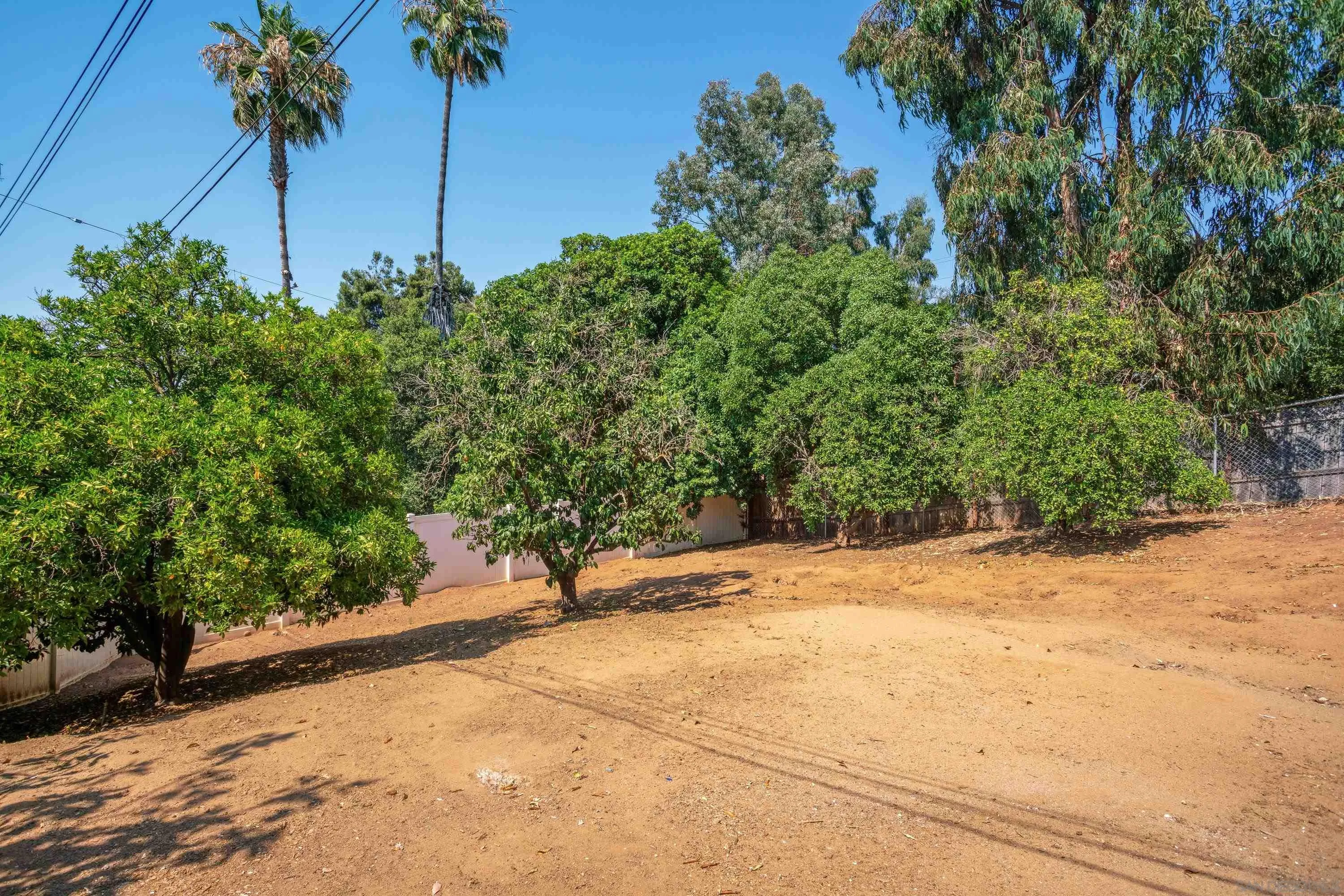 16355 Orchard Bend Road Poway, CA 92064 - Photo 33 of 49 a view of a backyard of a house
