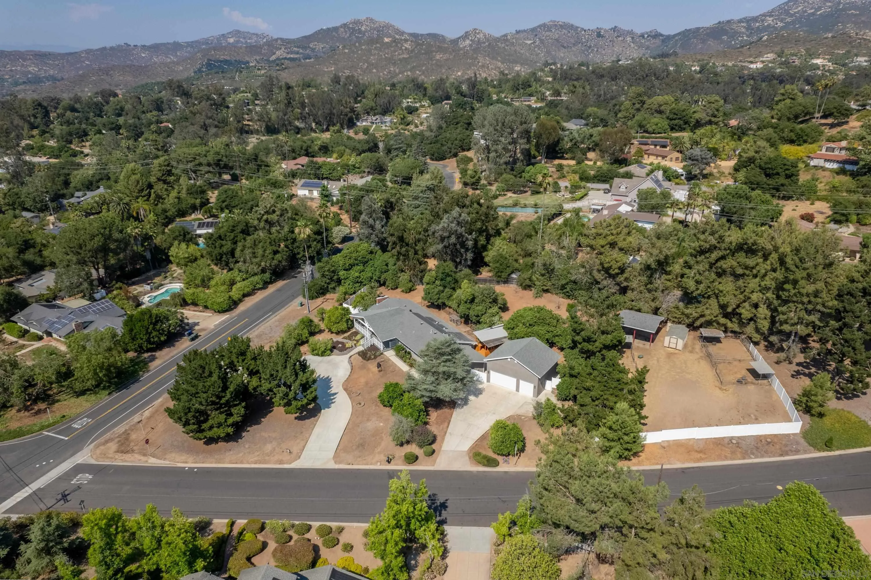 16355 Orchard Bend Road Poway, CA 92064 - Photo 39 of 49 an aerial view of a forest with houses