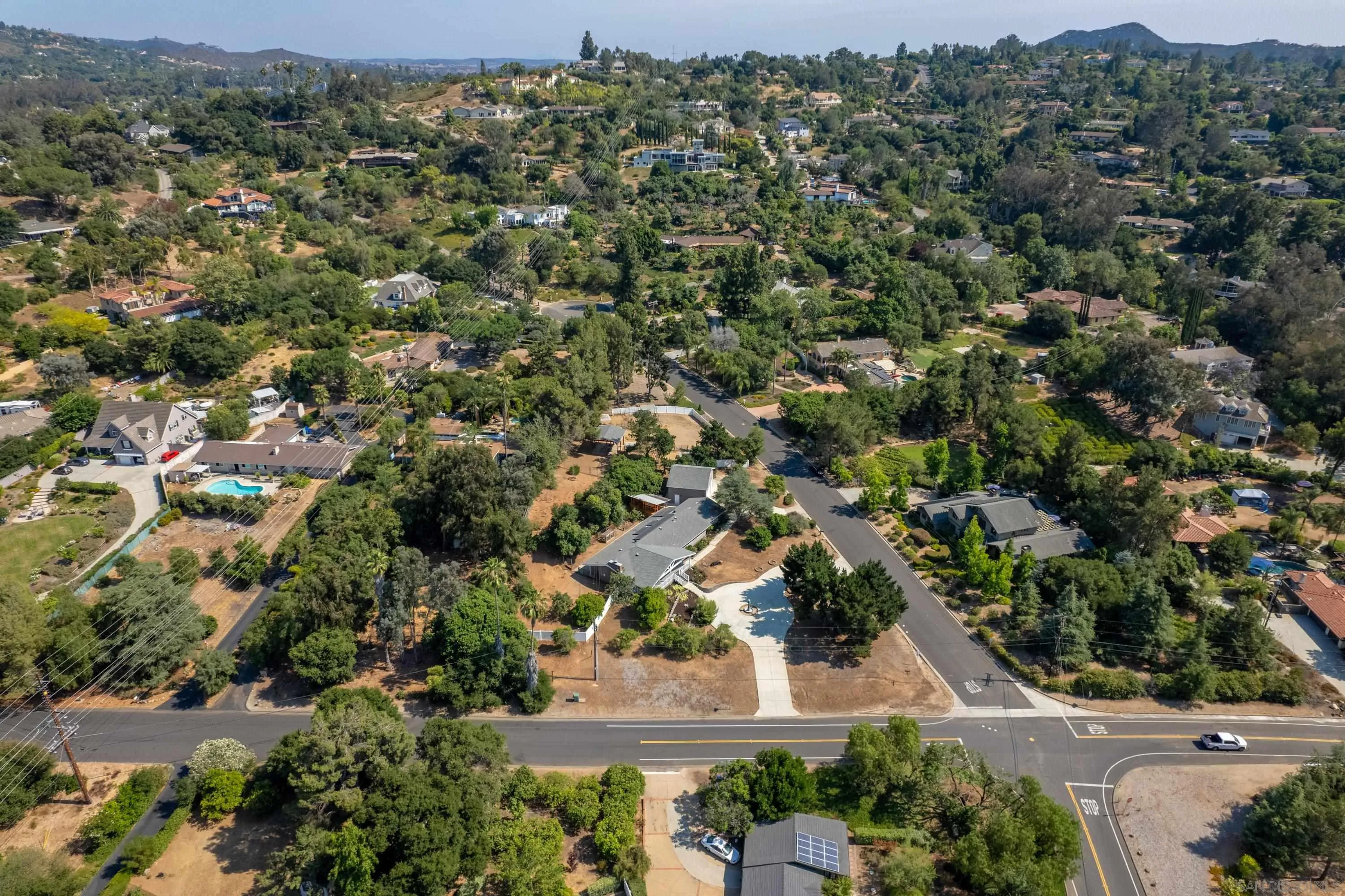 16355 Orchard Bend Road Poway, CA 92064 - Photo 44 of 49 an aerial view of residential houses with outdoor space and trees