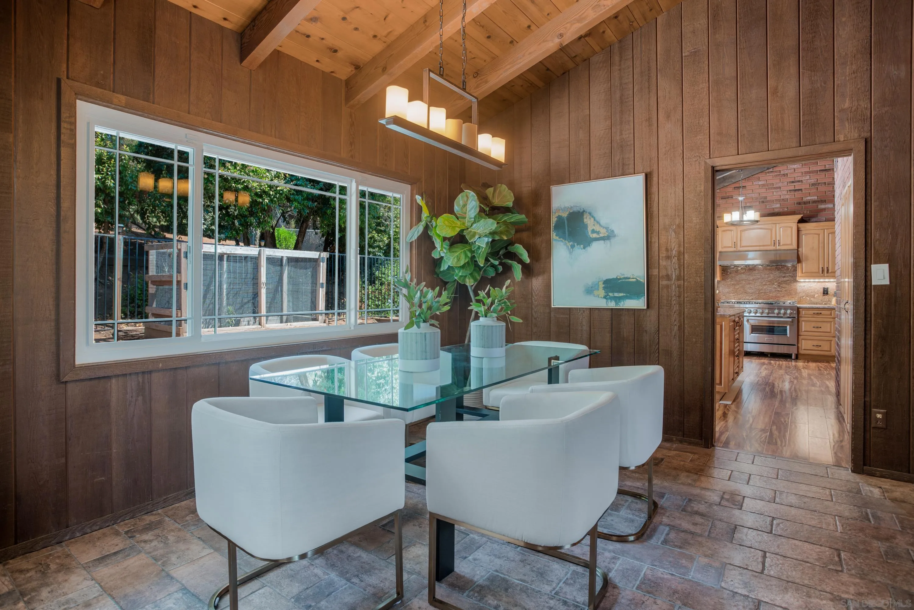 16355 Orchard Bend Road Poway, CA 92064 - Photo 9 of 49 a dining room with furniture and wooden floor