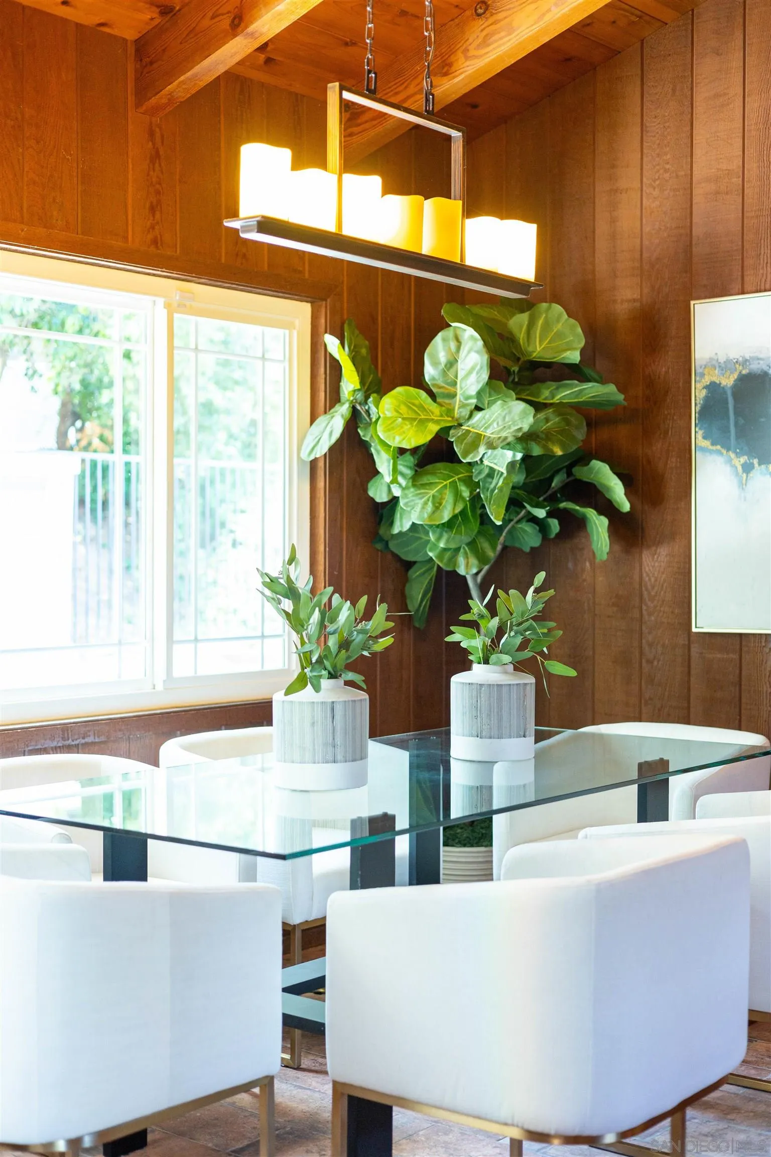 16355 Orchard Bend Road Poway, CA 92064 - Photo 10 of 49 a vase of flowers sitting on a table with window