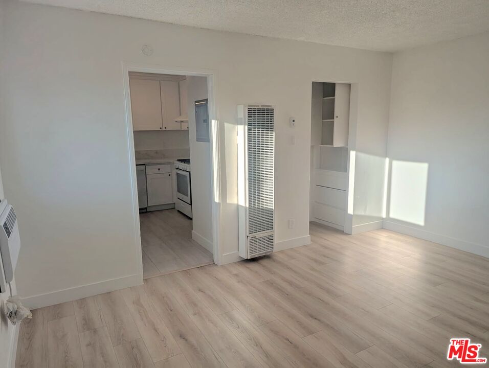 3841 Sedgwick Avenue Riverside, CA 92507 - Photo 6 of 10 wooden floor in an empty room