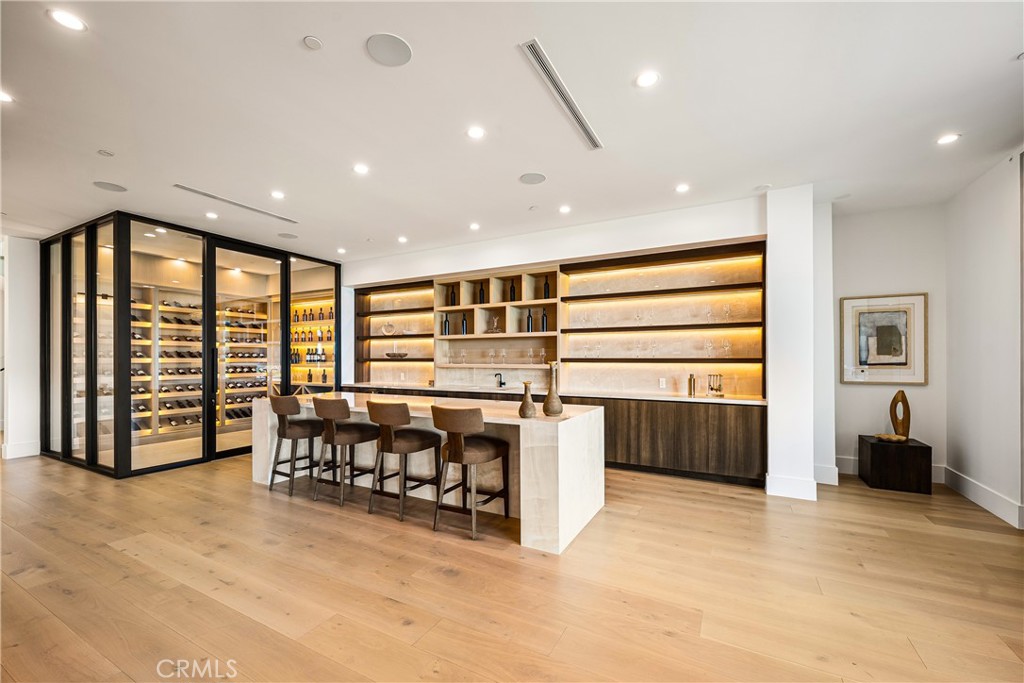 25079 Jim Bridger Road Hidden Hills, CA 91302 - Photo 16 of 73 a view of a room with furniture and window