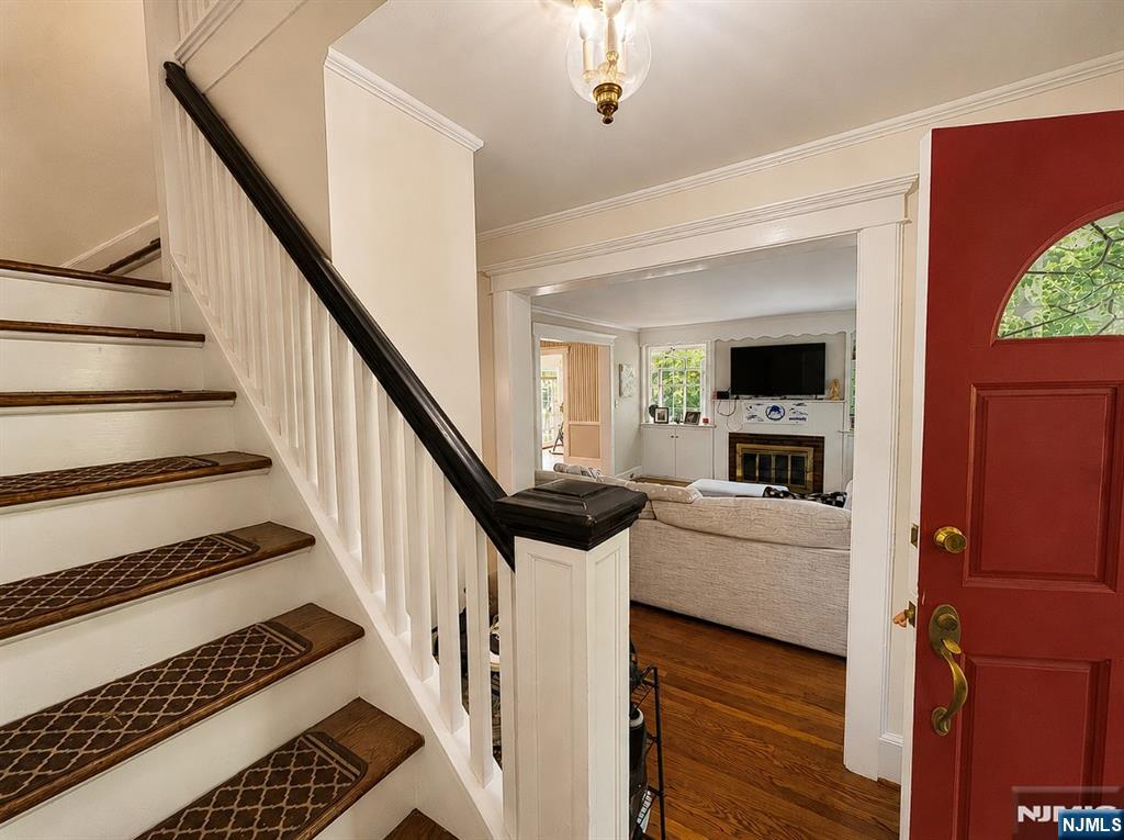 84 Valley View Avenue Ridgewood, NJ 07450 - Photo 3 of 20 a living room with furniture and a flat screen tv