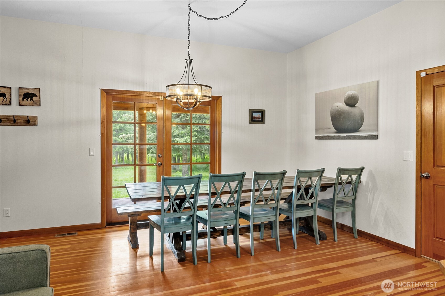 14997 Salmon La Sac Road Ronald, WA 98940 - Photo 16 of 39 a view of a dining room with furniture window and wooden floor