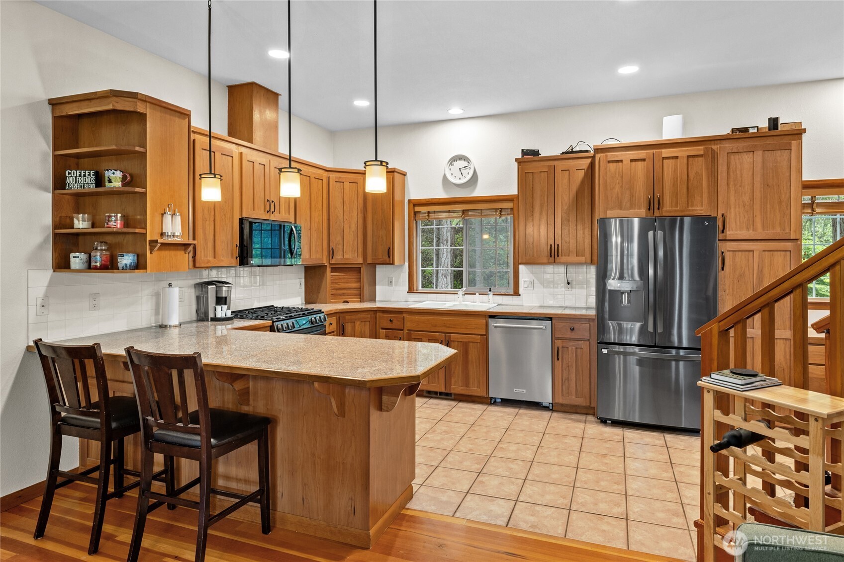 14997 Salmon La Sac Road Ronald, WA 98940 - Photo 17 of 39 a kitchen with refrigerator a sink and chairs