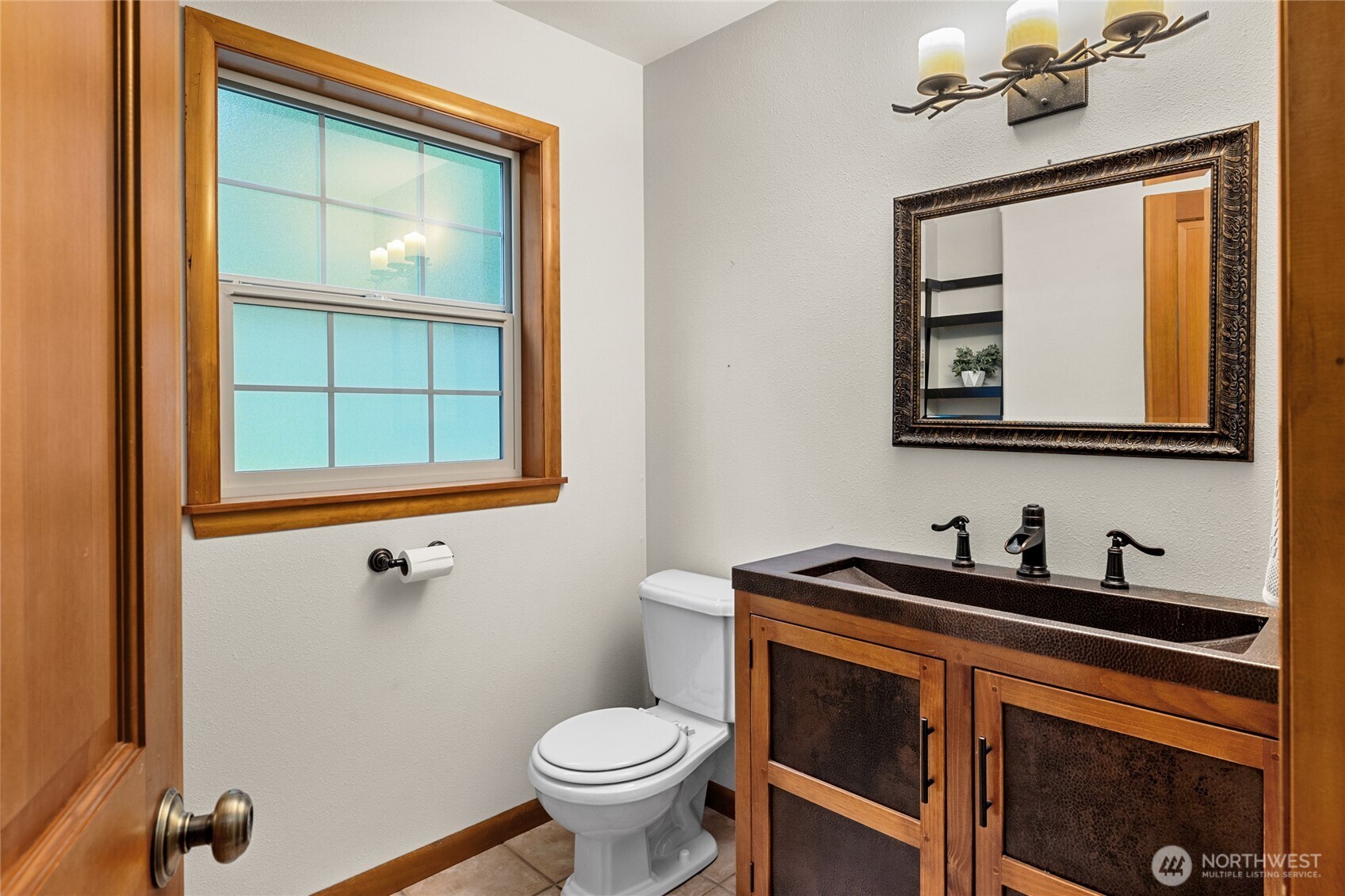 14997 Salmon La Sac Road Ronald, WA 98940 - Photo 21 of 39 a bathroom with a toilet sink and mirror
