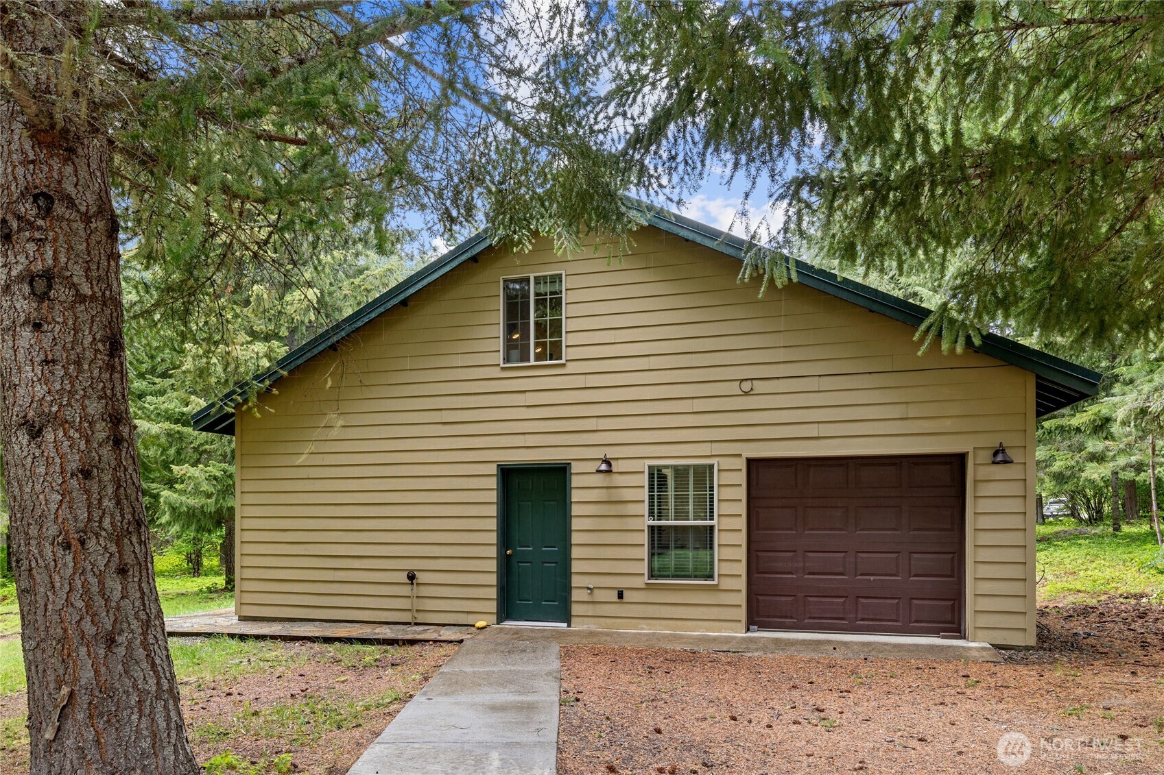 14997 Salmon La Sac Road Ronald, WA 98940 - Photo 29 of 39 a front view of a house with a tree