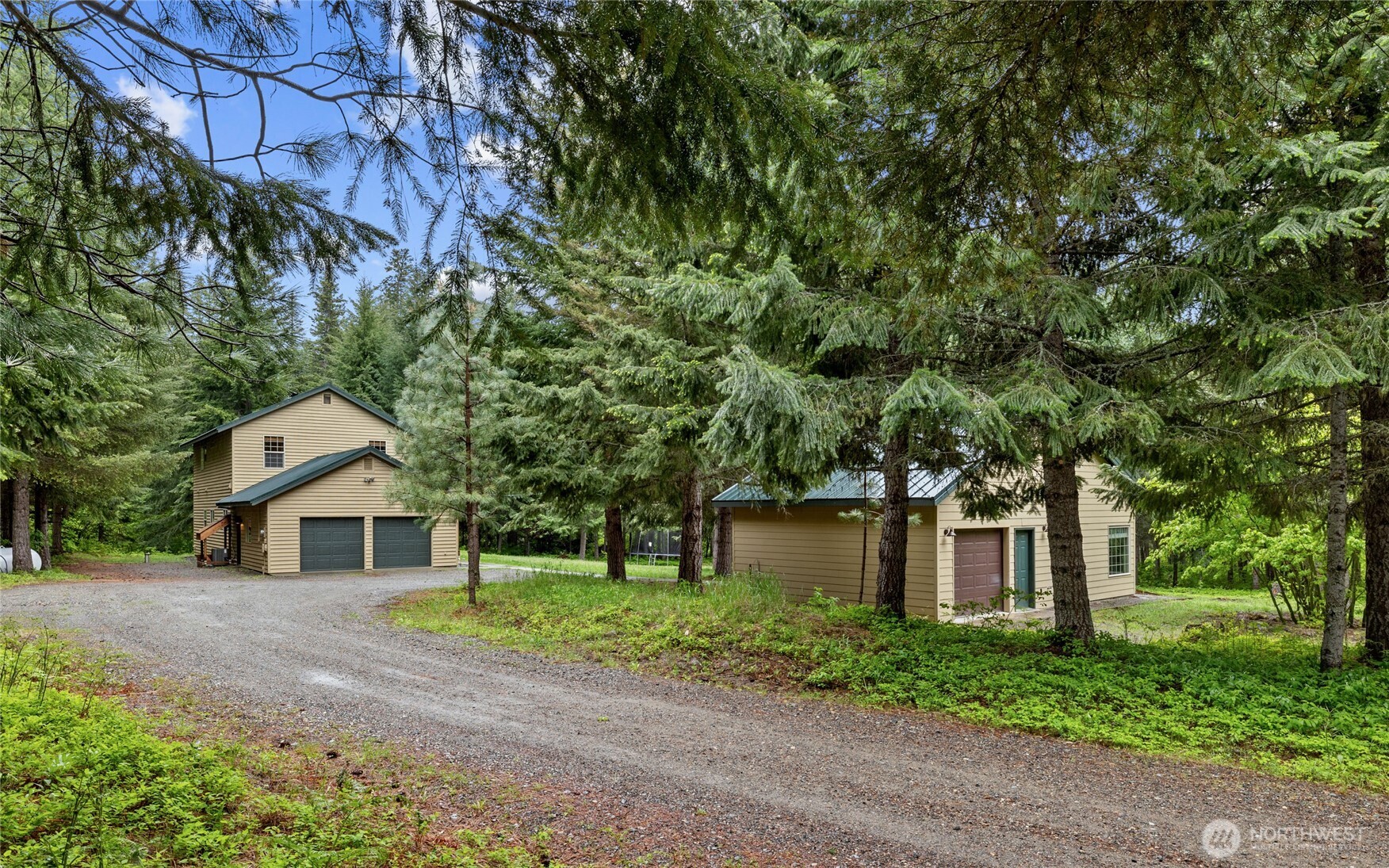 14997 Salmon La Sac Road Ronald, WA 98940 - Photo 39 of 39 a front view of a house with a yard and a garage