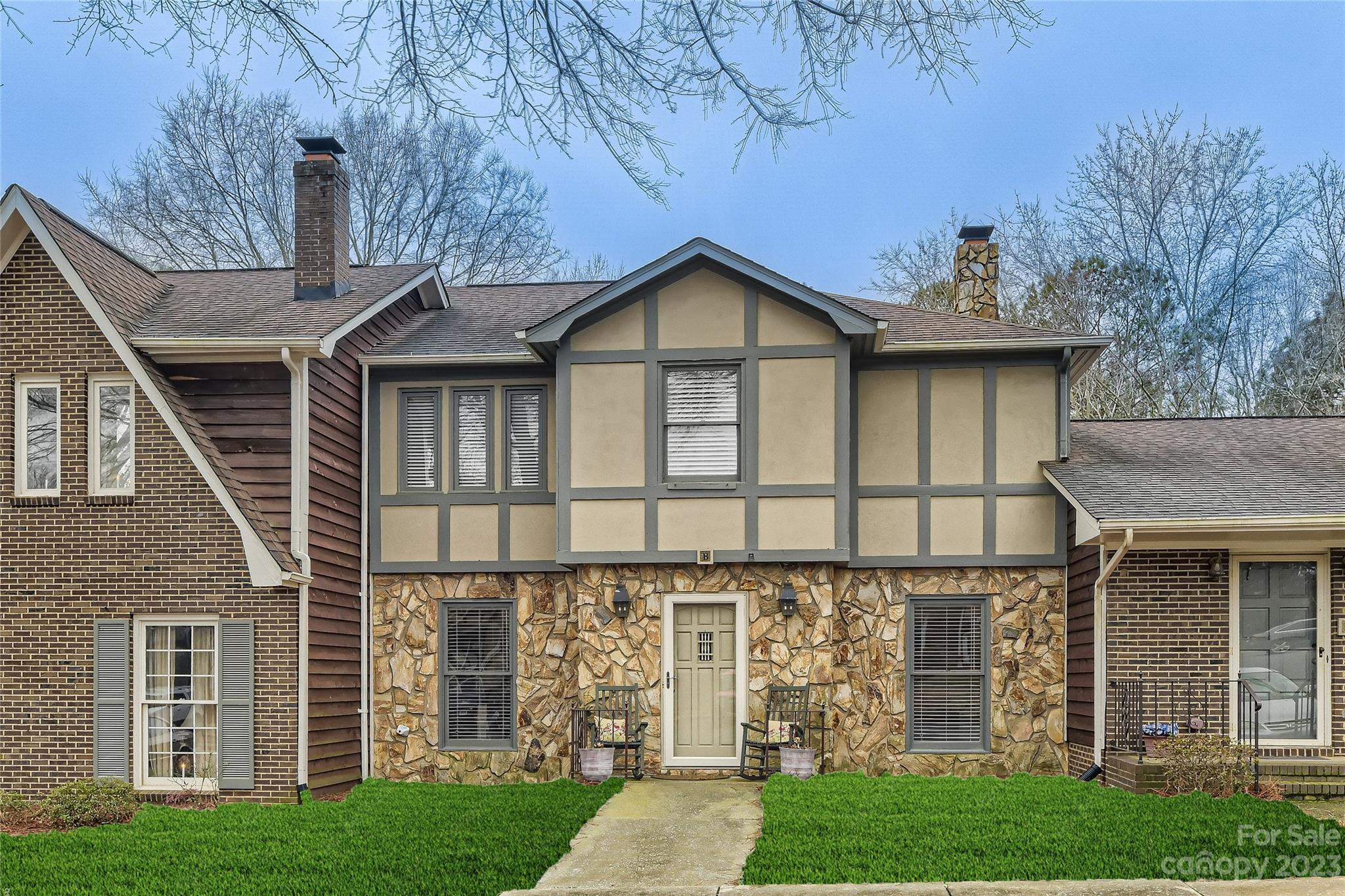 2500 Round Table Road, Unit B Monroe, NC 28110 - Photo 1 of 20 a front view of a house with a garden and plants