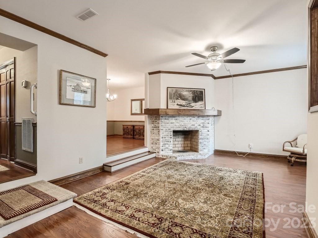 2500 Round Table Road, Unit B Monroe, NC 28110 - Photo 15 of 20 a living room with furniture and a fireplace
