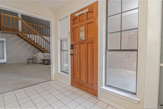 a view of an entryway with staircase