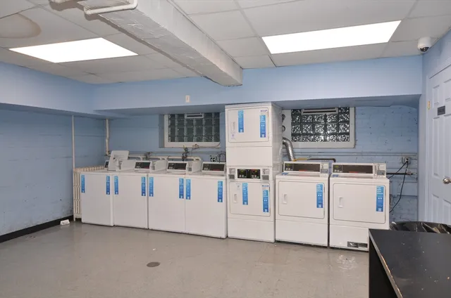 a white stove sitting inside of a kitchen