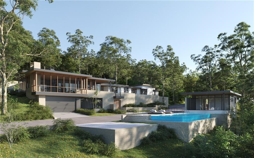 a view of house with outdoor space and swimming pool