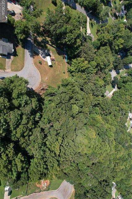 9142 Ford Street Southwest Covington, GA 30014 - Photo 11 of 15 an aerial view of residential house with outdoor space and trees all around